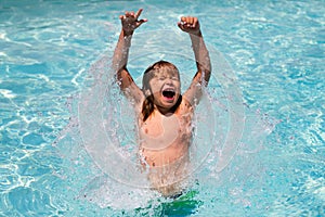 Excited kid boy in pool. Child swimming in water pool. Summer kids activity, watersports.