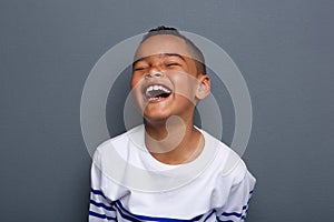 Excited little boy laughing photo