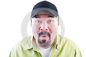 Excited man in baseball cap on white background