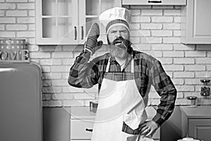 Excited man chef cook wearing uniform showing Masterclass cooking dish.