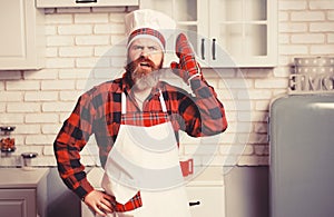 Excited man chef cook wearing uniform showing Masterclass cooking dish.