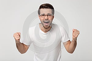 Excited man in glasses feel excited for good sale offer