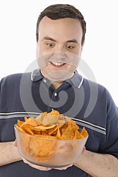 Excited Man Holding Bowl Of Nachos