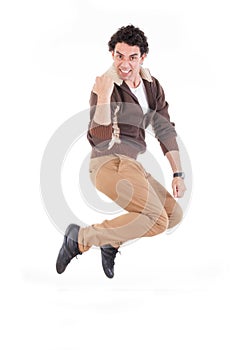 Excited man jumping out of joy achieving success