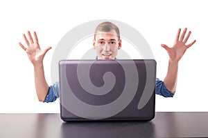 Excited man at laptop