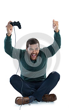 Excited man playing video games
