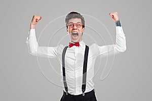 Excited man screaming and celebrating victory