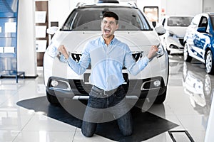 Excited Man Shouting Shaking Fists Buying New Car