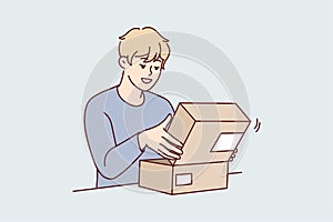 Excited man unpack post parcel