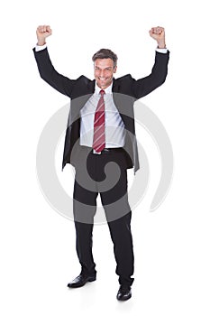 Excited mature businessman