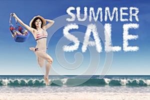 Excited model with summer sale cloud