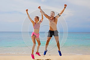 Excited people after workout on the beach