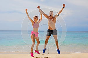 Excited people after workout on the beach photo