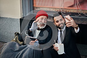 Excited senior homeless with businessman