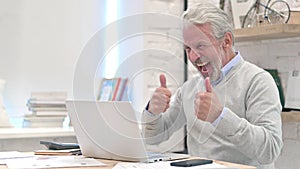 Excited Senior Old Man Celebrating Success on Laptop