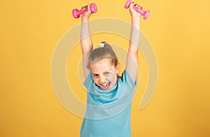 Excited sport and fitness girl, kids health and energy. Healthy children lifestyle. Cheerful boy do exercises with