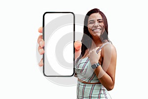 Excited surprised girl showing smart phone with blank screen , white screen isolated on white background