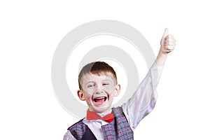Excited Surprised little boy with thumb up gesture