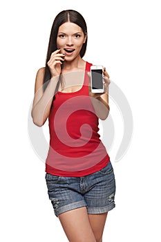 Excited surprised woman showing cell phone