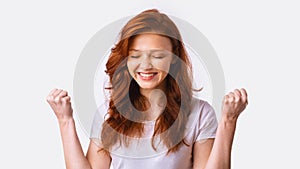 Excited Teen Girl Gesturing Yes Shaking Fists, Panorama, Studio Shot