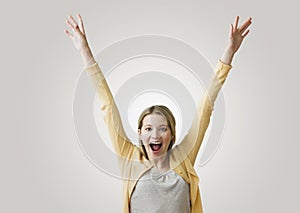 Excited Woman with Arms in the Air