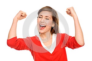 Excited woman with arms raised