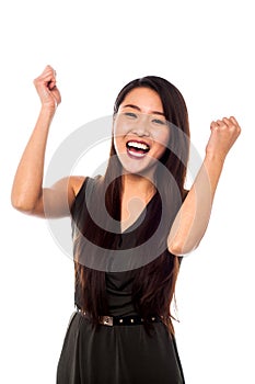 Excited woman with clenched fists