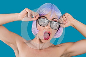 Excited woman in glasses with gems