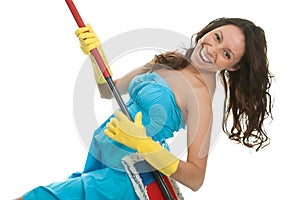 Excited woman having fun while cleaning