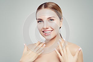 Excited woman with healthy clear skin, cute smile