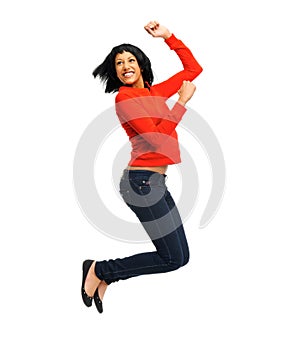Excited woman jumps in joy