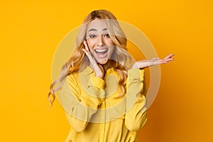 Excited Woman Presenting Something On her Empty Palm