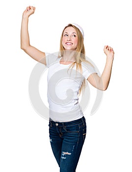 Excited Woman with red christmas hat raised two hand up