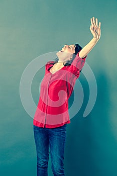 Excited woman shouting with euphoric body language