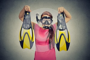 Excited woman with snorkel equipment isolated grey background