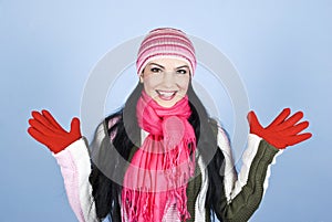 Excited woman in winter clothes