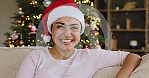 Excited young indian lady congratulate family with Christmas by videocall