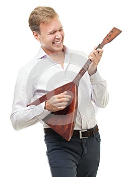 Excited young man playing balalaika, isolated on