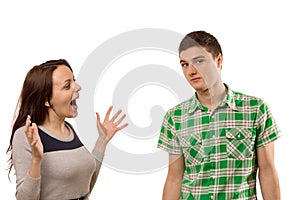 Excited young woman gesturing at her boyfriend