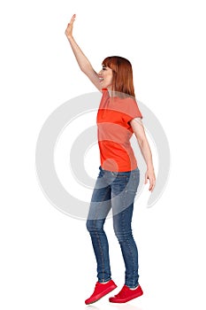 Excited Young Woman Is Standing And Waving Hand. Side View