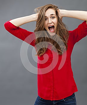 Excitement and humor concept for beautiful young woman