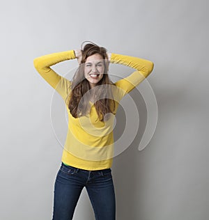 Excitement and humor concept for ecstatic 20s girl photo