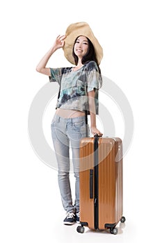 Exciting Asian woman drag a luggage