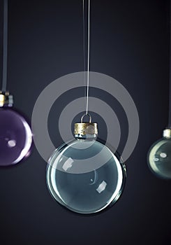 Exciting Glass christmas balls hanging in front of dark grey background