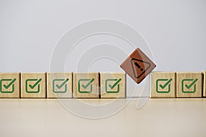 Exclamation caution warning sign symbol interrupt among correct sign mark for notification error and maintenance concept photo