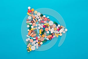 Exclamation mark arranged from assorted pharmaceutical medicine pills, tablets and capsules