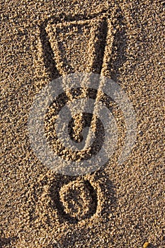 Exclamation sign in sand