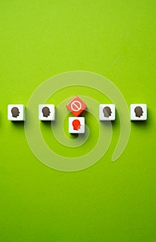Exclusion of a person from society. Non-conforming or socially unacceptable behavior. photo