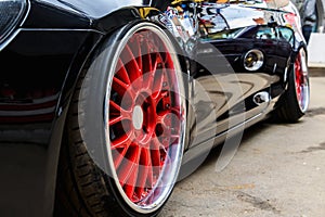 Exclusive tuned car disk close-up. Tuned disk on a sports car for drifting photo