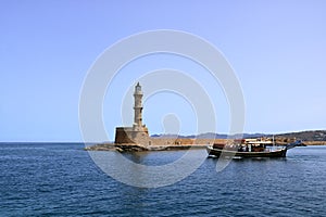 Excursion boat cruising Venetian harbour and mediterranean sea of Chania, Crete, Greece